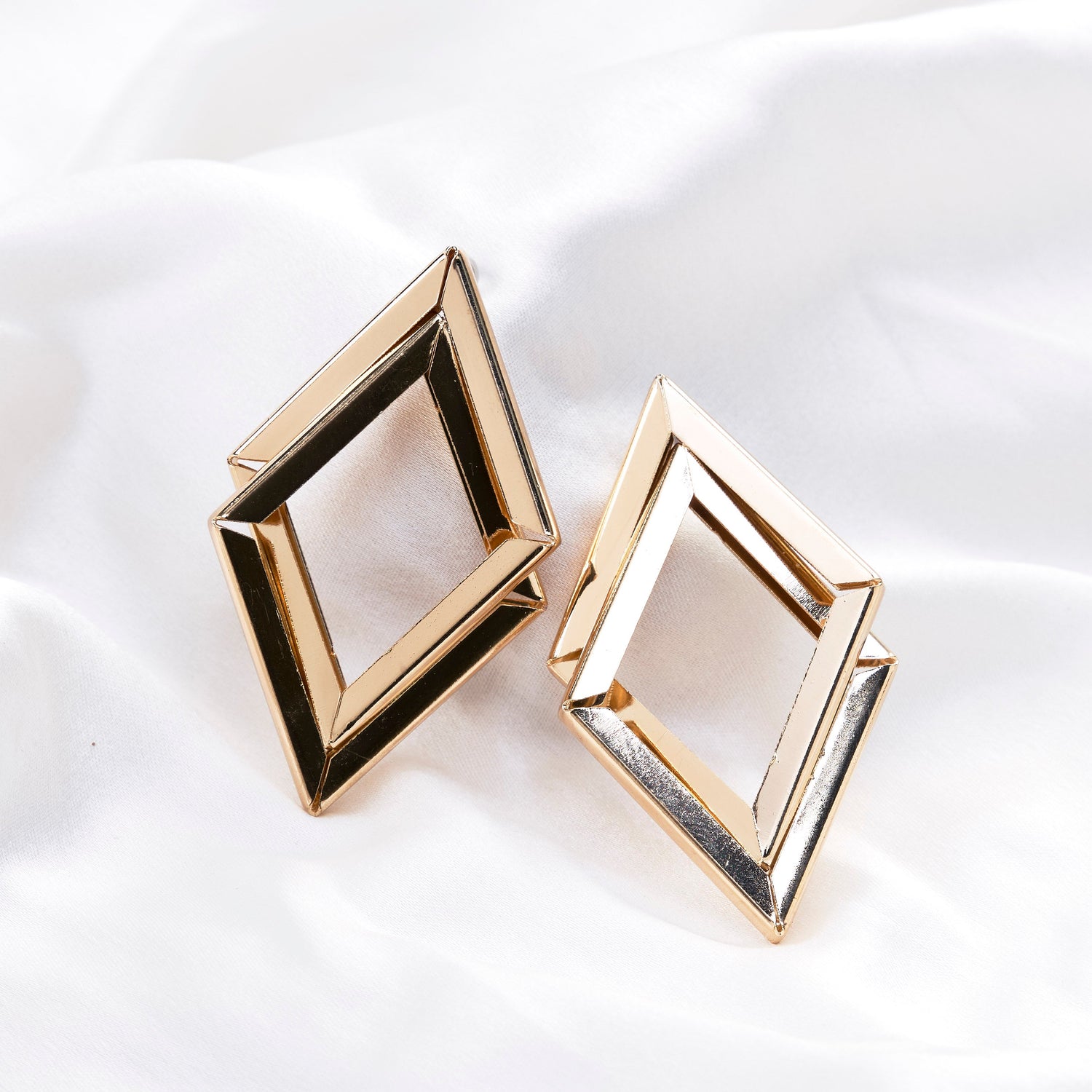 Earrings styled with traditional Indian attire and makeup - Opal Touch
