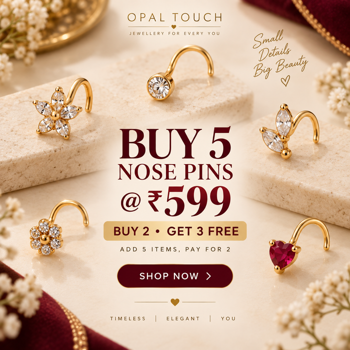 Promotional jewelry ad for Opal Touch nose pins showing five gold nose pins arranged on cream blocks with decorative flowers and maroon fabric. Large text reads 'BUY 5 NOSE PINS @₹599' with a 'SHOP NOW' button.