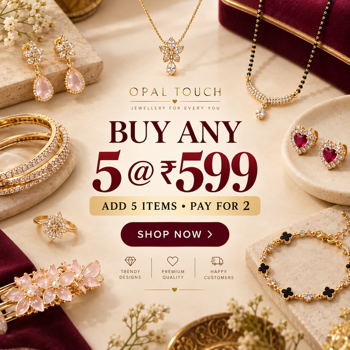A promotional jewelry ad for Opal Touch showing multiple pieces of gold jewelry arranged on a beige surface with velvet cushions. The central text reads 'BUY ANY 5 @ ₥599' with a 'SHOP NOW' button, and visible jewelry includes necklaces, earrings, bracelets, rings, and a hair accessory.