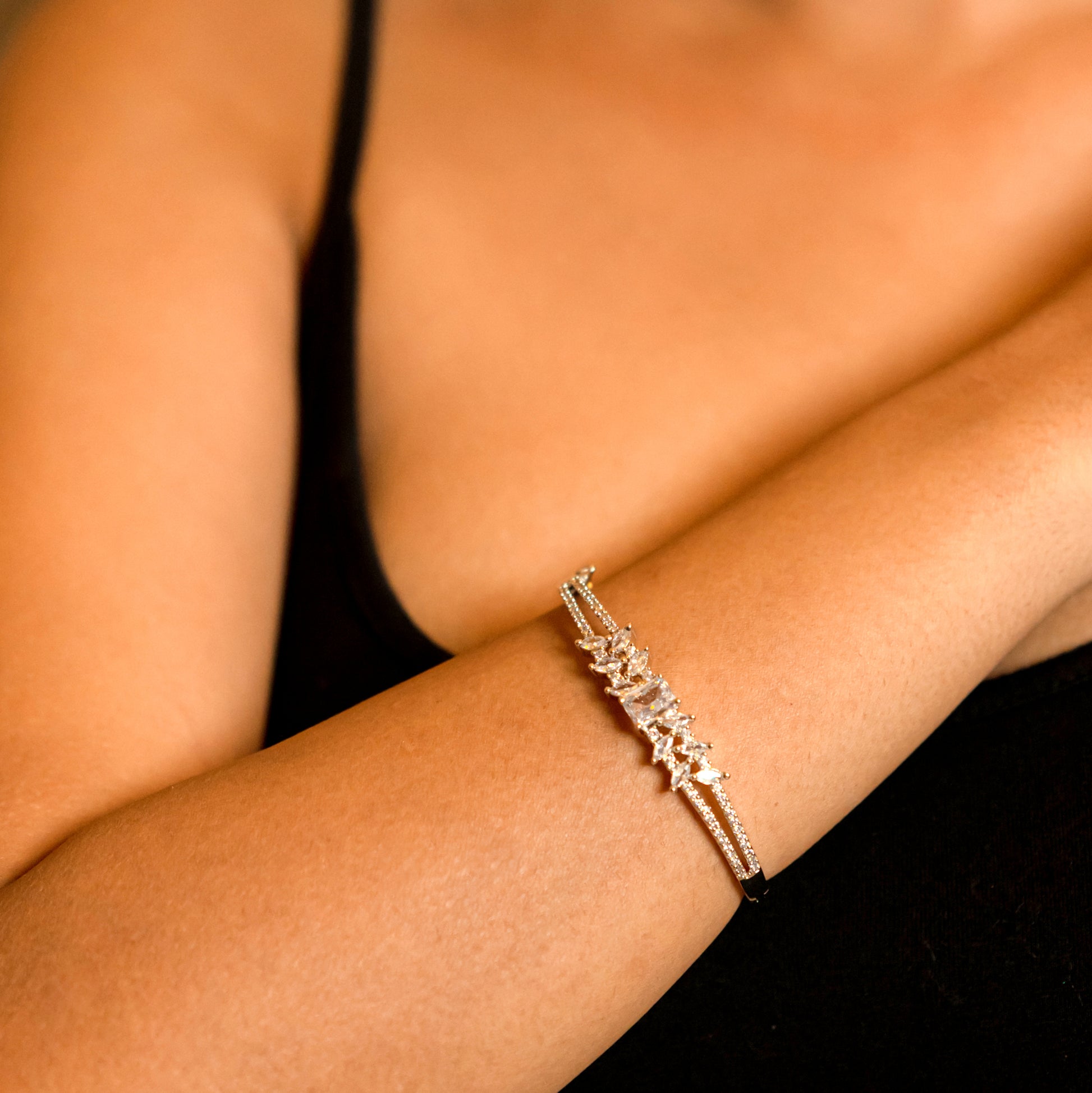 Women wear Divine White Rhodium Bracelet