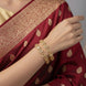 Gold Plated American Diamond Oval Pattern Designer Bangles Set (Pack of 2)