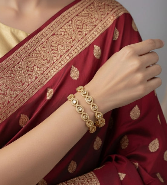 Gold Plated American Diamond Oval Pattern Designer Bangles Set (Pack of 2)