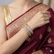 Gold Plated American Diamond Criss Cross Twist Pattern Designer Bangles Set (Pack of 2)