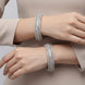 Stone Studded Designer Bangle Set with Intricate Leaf Pattern and Layered Stonework
