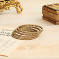 Mehendi Plated Baguette Stone Line Pattern Designer Bangles Set (Pack of 4)