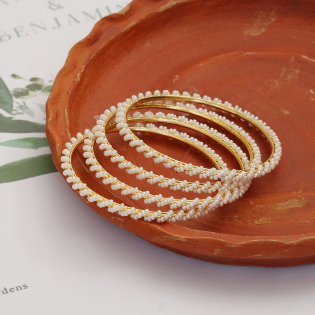 Gold Plated Handcrafted Pearl Vine Pattern Designer Bangles Set (Pack of 4)