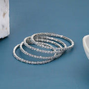 Rhodium Plated Baguette & Oval Stone Pattern Designer Bangles Set (Pack of 4)