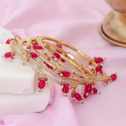 Gold Plated American Diamond Beaded Charm Pattern Designer Bangles Set (Pack of 4)