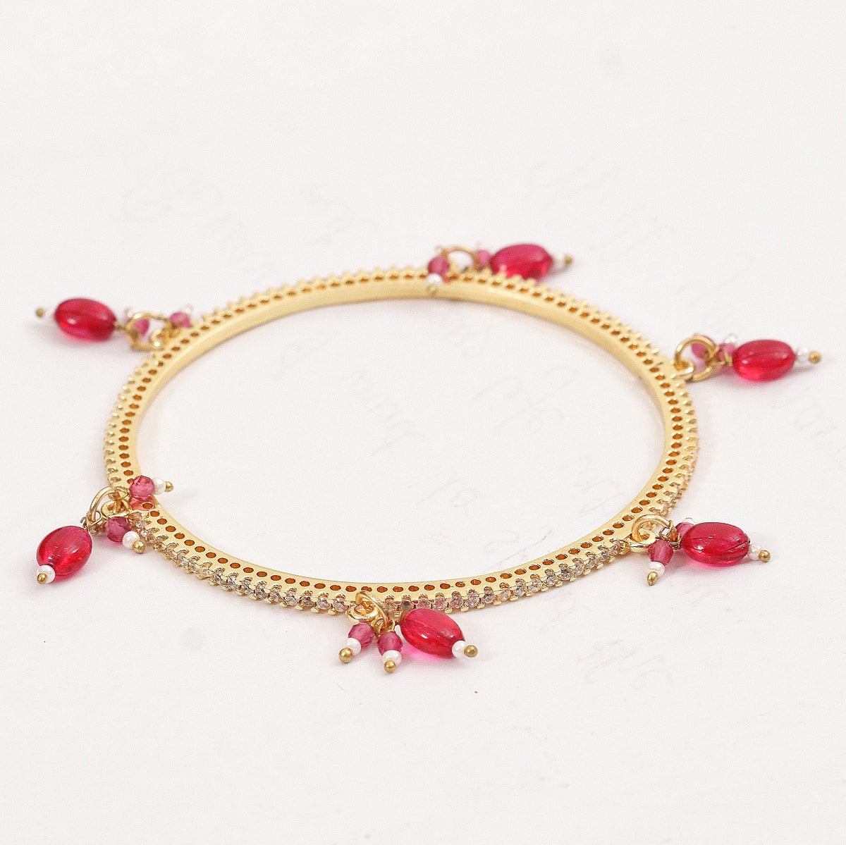 Gold Plated American Diamond Beaded Charm Pattern Designer Bangles Set (Pack of 4)