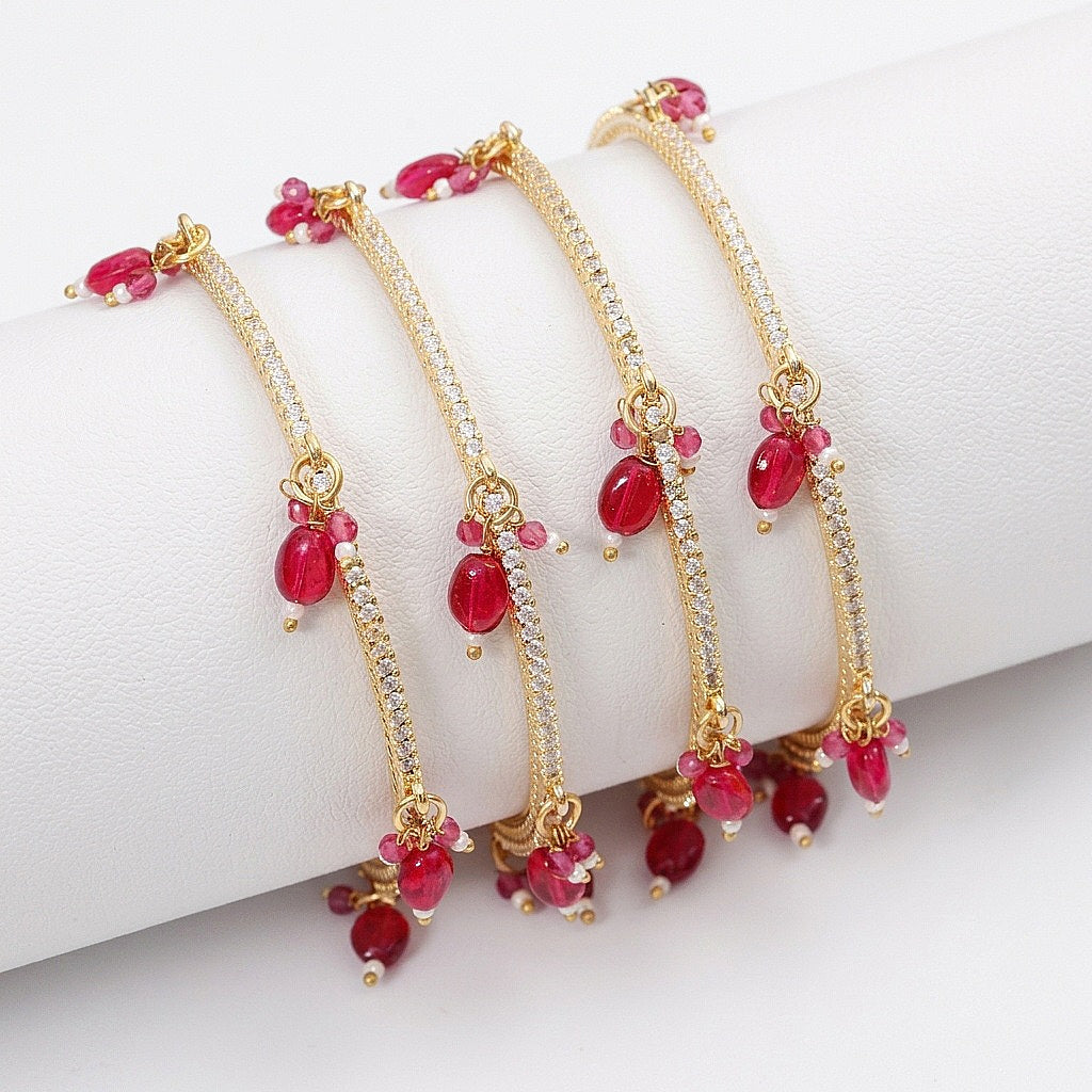Gold Plated American Diamond Beaded Charm Pattern Designer Bangles Set (Pack of 4)