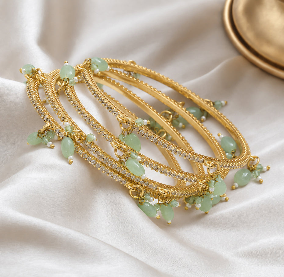 Gold Plated American Diamond Beaded Charm Pattern Designer Bangles Set (Pack of 4)