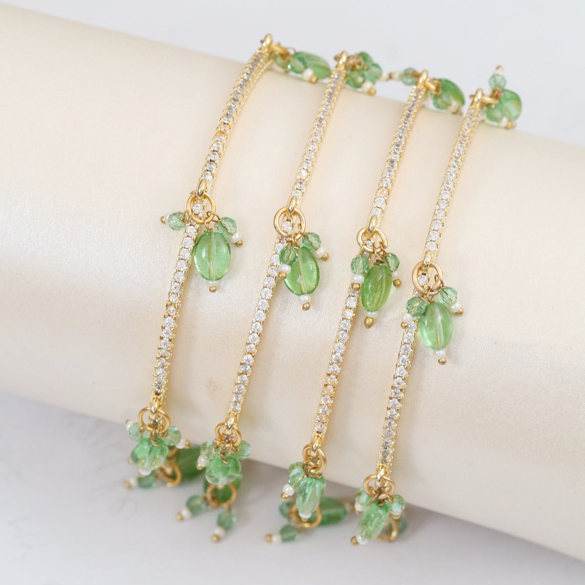 Gold Plated American Diamond Beaded Charm Pattern Designer Bangles Set (Pack of 4)