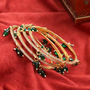 Gold Plated American Diamond Beaded Charm Pattern Designer Bangles Set (Pack of 4)