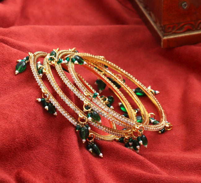 Gold Plated American Diamond Beaded Charm Pattern Designer Bangles Set (Pack of 4)