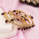 Gold Plated American Diamond Beaded Charm Pattern Designer Bangles Set (Pack of 4)