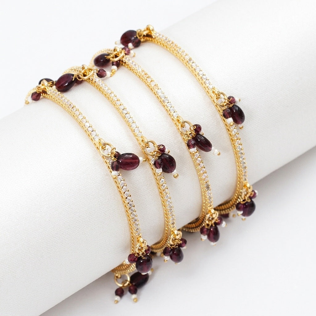 Gold Plated American Diamond Beaded Charm Pattern Designer Bangles Set (Pack of 4)
