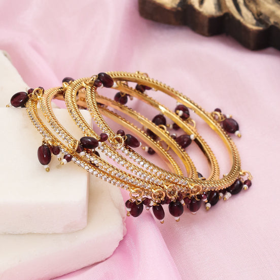 Gold Plated American Diamond Beaded Charm Pattern Designer Bangles Set (Pack of 4)