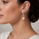 Rhodium Plated Curved Leaf Pearl Drop Earrings