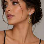 Rhodium Plated American Diamond Teardrop Dangle Earrings with Pear Cut Stone