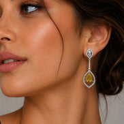 Rhodium Plated American Diamond Teardrop Dangle Earrings with Pear Cut Stone