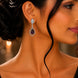 Rhodium Plated American Diamond Teardrop Dangle Earrings with Pear Cut Stone