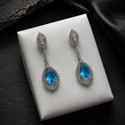 Rhodium Plated American Diamond Teardrop Dangle Earrings with Pear Cut Stone