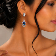Rhodium Plated American Diamond Teardrop Dangle Earrings with Pear Cut Stone