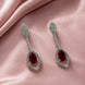 Rhodium Plated American Diamond Teardrop Dangle Earrings with Pear Cut Stone