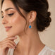 Rhodium Plated Oval Halo Drop Earrings with Sparkling Stone Accent
