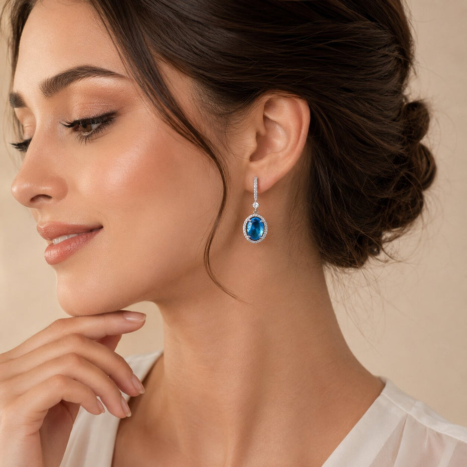 Rhodium Plated Oval Halo Drop Earrings with Sparkling Stone Accent