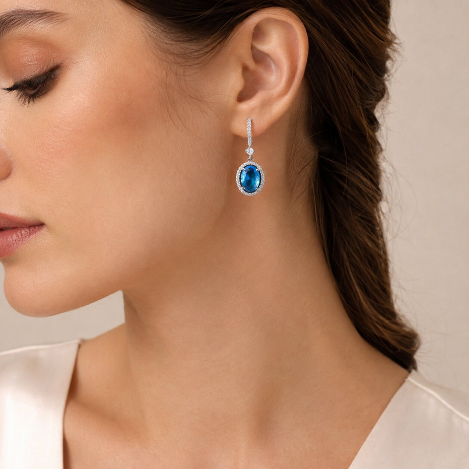 Rhodium Plated Oval Halo Drop Earrings with Sparkling Stone Accent