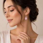 Rhodium Plated Oval Halo Drop Earrings with Sparkling Stone Accent