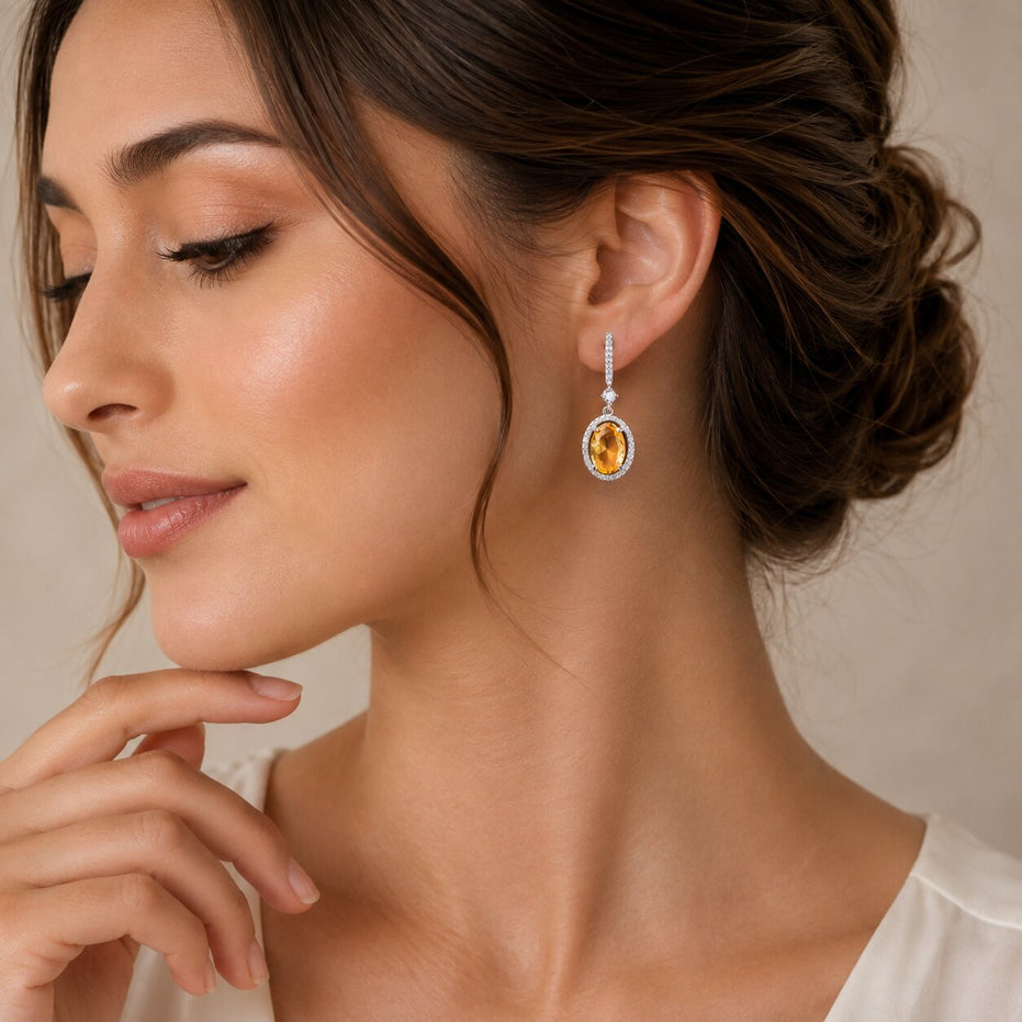 Rhodium Plated Oval Halo Drop Earrings with Sparkling Stone Accent