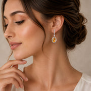 Rhodium Plated Oval Halo Drop Earrings with Sparkling Stone Accent