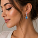 Rhodium Plated Pear Halo Drop Earrings with Sparkling Stone Accent