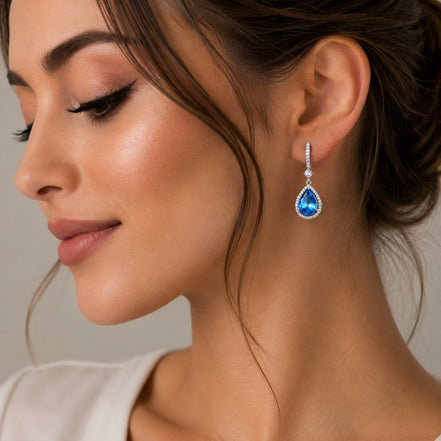 Rhodium Plated Pear Halo Drop Earrings with Sparkling Stone Accent