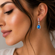 Rhodium Plated Pear Halo Drop Earrings with Sparkling Stone Accent