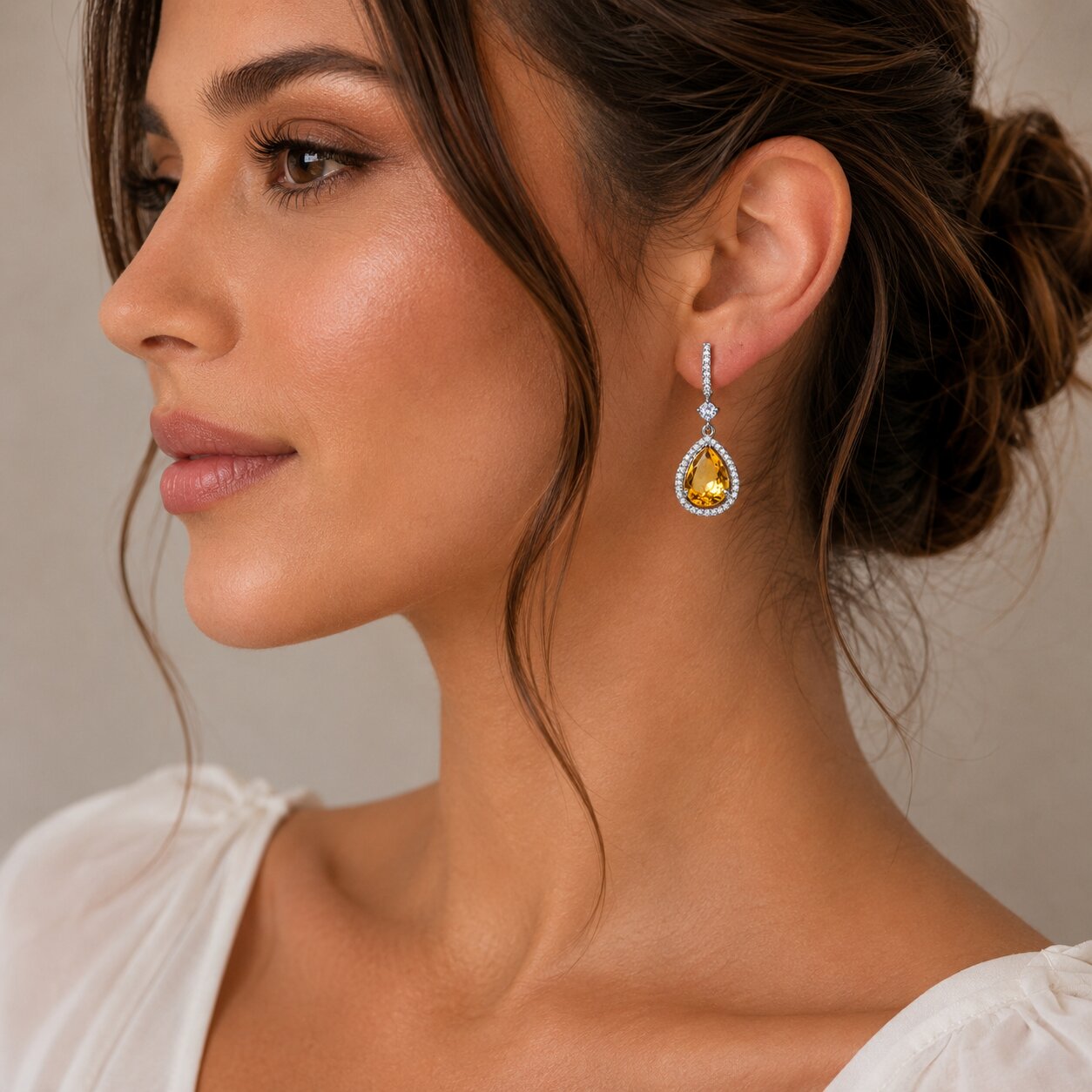 Rhodium Plated Pear Halo Drop Earrings with Sparkling Stone Accent