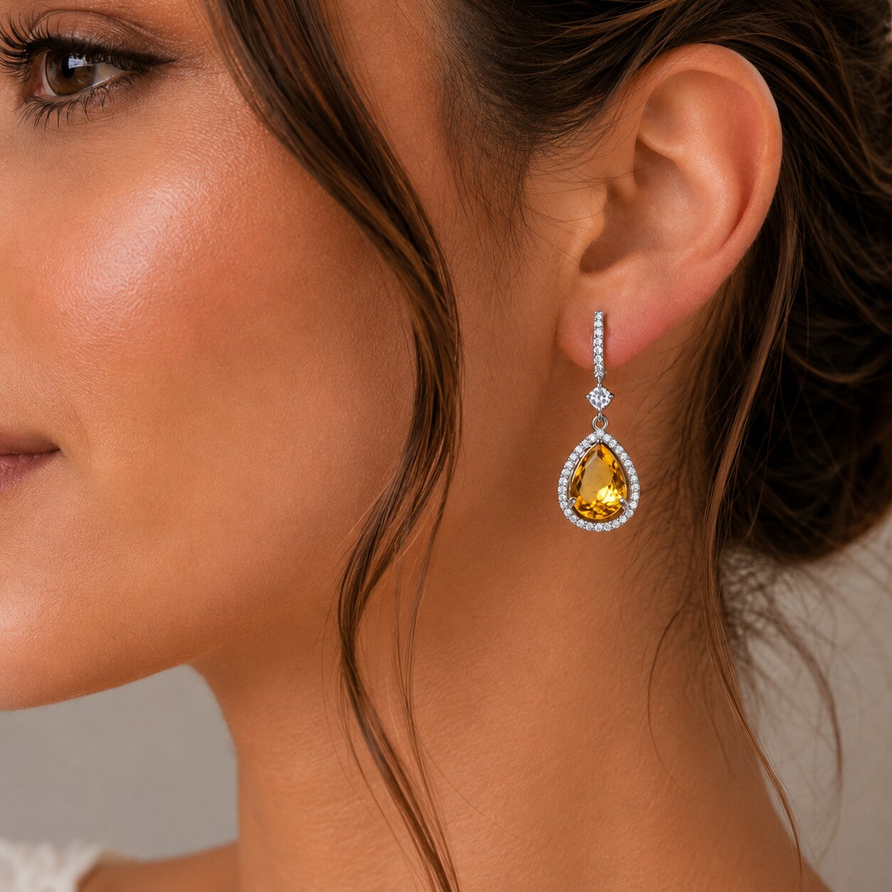Rhodium Plated Pear Halo Drop Earrings with Sparkling Stone Accent