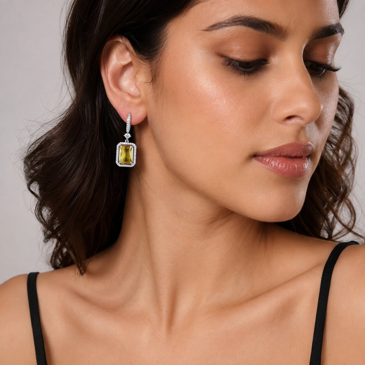 Rhodium Plated Emerald Cut Halo Drop Earrings with Sparkling Stone Accent