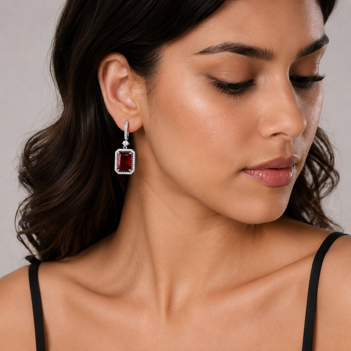 Rhodium Plated Emerald Cut Halo Drop Earrings with Sparkling Stone Accent