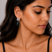 Rhodium Plated Pear Drop Earrings with Floral Stone Design