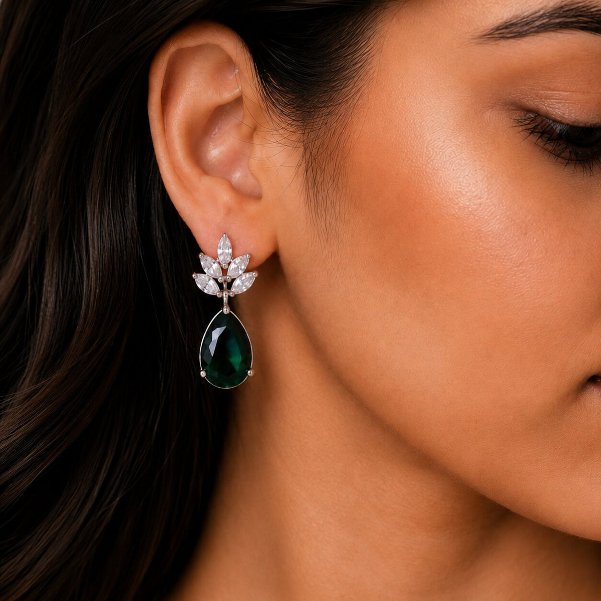 Rhodium Plated Pear Drop Earrings with Floral Stone Design
