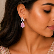 Rhodium Plated Pear Drop Earrings with Floral Stone Design
