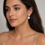 Rhodium Plated Square Halo Drop Earrings with Floral Stone Design
