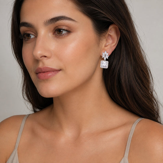 Rhodium Plated Square Halo Drop Earrings with Floral Stone Design