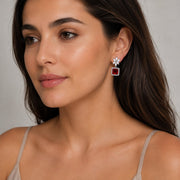 Rhodium Plated Square Halo Drop Earrings with Floral Stone Design