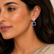 Rhodium Plated Square Halo Drop Earrings with Floral Stone Design
