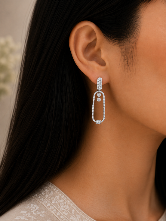 Rhodium Plated Pave American Diamond Oval Drop Earrings