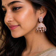 Rose Gold Plated American Diamond Oval Floral Filigree Jhumka Earrings